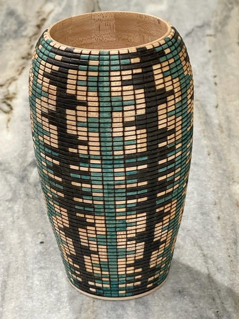 wood urn with turquoise and black stripes by john beall
