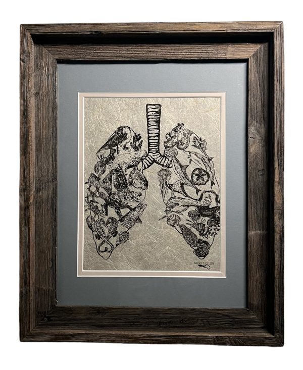 framed print with a pair of lungs - looking closer you see animals and more.