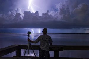 a night time lightning storm with the photographer, Quinn Sedam
